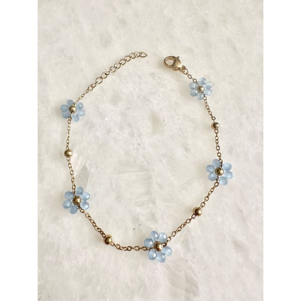 Delicate light blue beaded flower chain bracelet